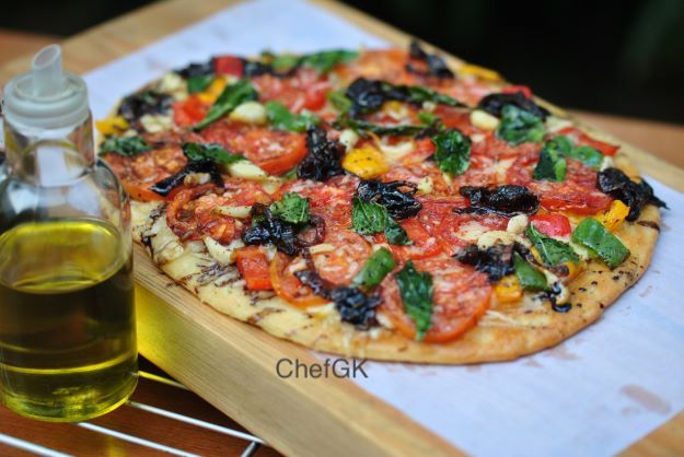 ChefGKrishnan's tweet photo. My Sunday Kitchen Table
Today on My Kitchen Table- Country style whole wheat pizza with tomato &amp; bell peppers. A classic from Italian homes.
#sundaycooking #mykitchentable #pizza #italian #classic #countrystyle #chefforlife #nofilter

You can find the recipe on my website. https://t.co/G05aNZglzi