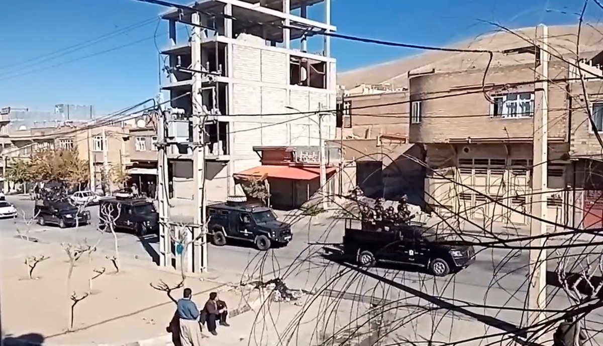 ali_rnejad's tweet photo. While people in west are buying biers for WM shows, #IRGCTerrorists are marching with heavy military equipments in iran cities (#mahabad) to terorr (=crackdown in west media) protestors. 
#IranRevolution https://t.co/MX9Me7tWdQ