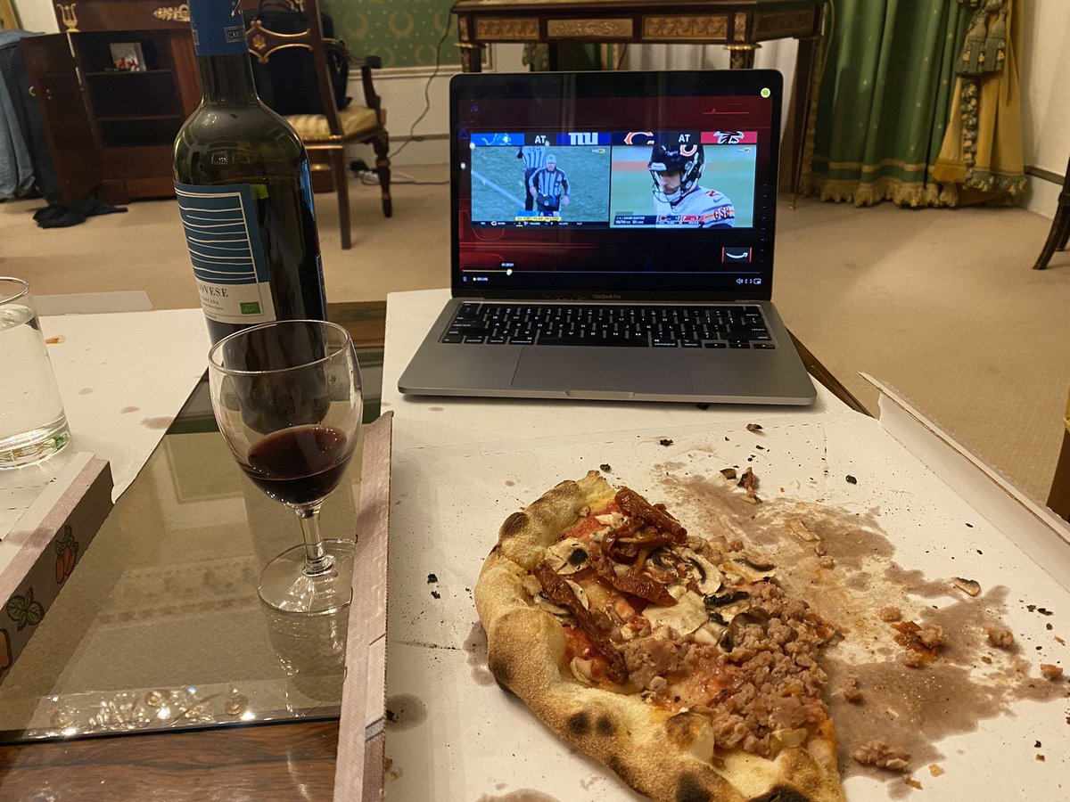 ladd_biro's tweet photo. @ScottHanson @nflnetwork Sure, it’s our last night in Rome, but what could be better than watching @NFLRedZone with pizza and wine in our hotel room? https://t.co/kyPDgXAk9r