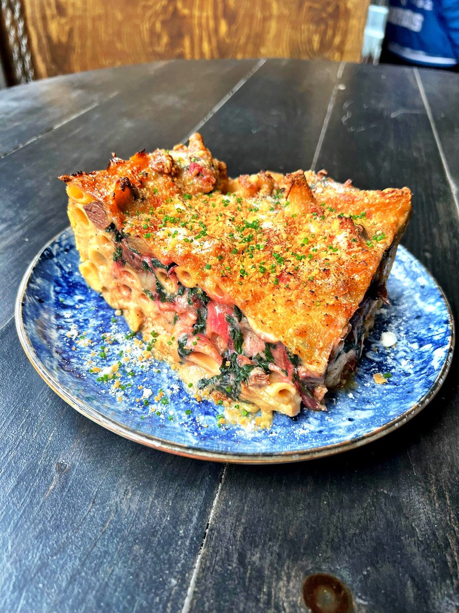 Stout braised beef cheeks pasta al forno with beef jus béchamel, smoked provolone, garlic Swiss chard, topped with pecorino and breadcrumbs <a href="/BloodBrothersTO/">Blood Brothers Brewing</a> 

#beastatbloodbrothers