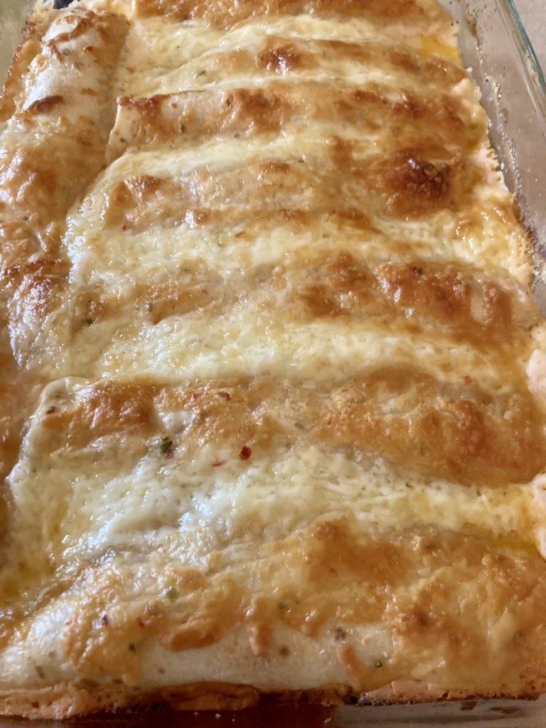 Cream cheese shrimp enchiladas are on their way to a Friendsgiving Dinner 😍👩‍🍳