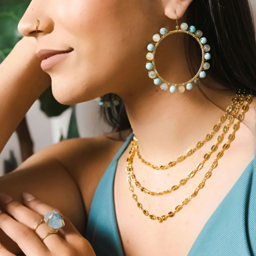 FabulinaDesigns's tweet photo. The Aquamarine hoop earrings are simple, elegant, and timeless. 😍😍✨A classic gold hoop with a twist of freshwater aquamarine brings some sparkle to the day✨💙💓. Aquamarine ing and erring that goes hand in hand make a perfect pair👏🏽👏🏽.  #befabulina
.
.
. https://t.co/mIMuLC2Xo1