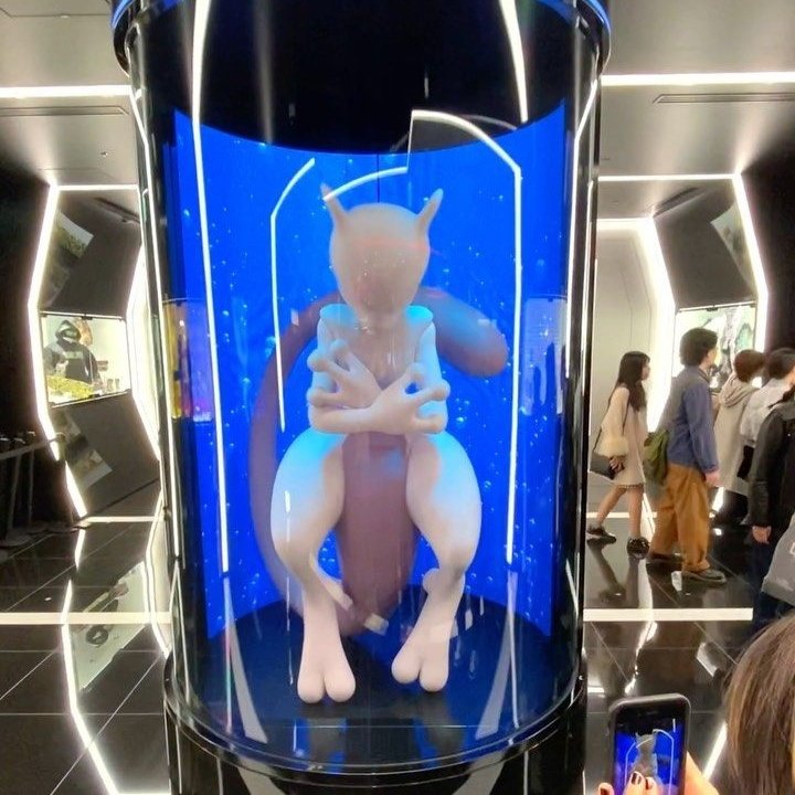 GALVANLazarus's tweet photo. @TheYisusOne The updated one reminds me more of the one from the Pokemon Center in Japan with Mewtwo in a test tube! https://t.co/gsOCXVmN82