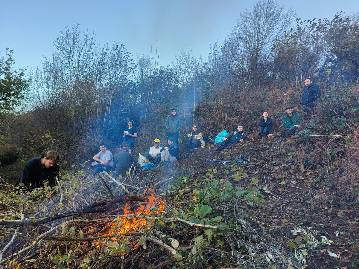 LynEvans2's tweet photo. @BridgendCollege Conservation Volunteers working today with @savebutterflies to clear scrub for the High Brown Fritillary. Great to have both old and new students out enjoying the weather and the bonfire! https://t.co/Ob1KbUZnmF