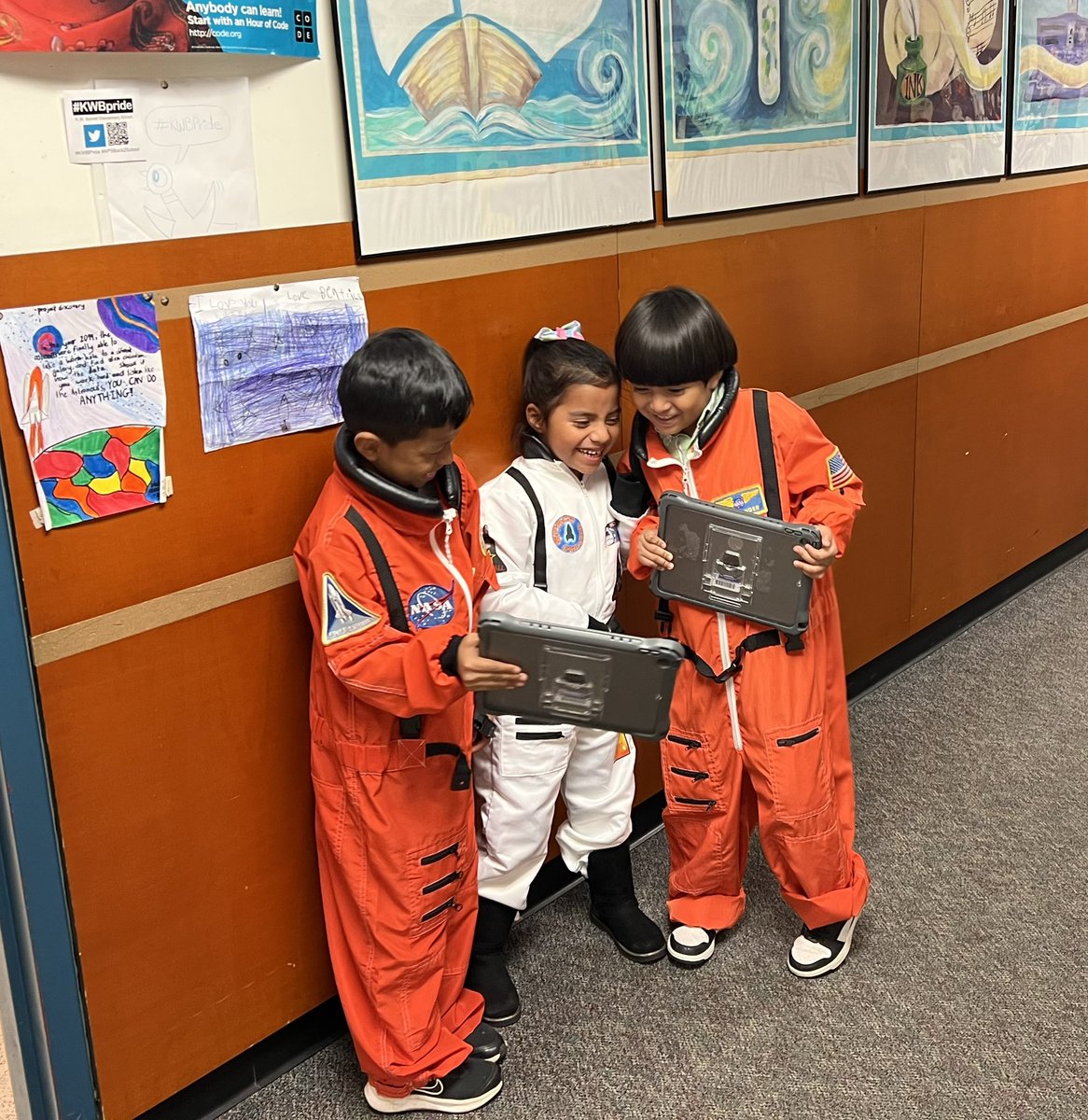 lsullivan's tweet photo. Students astronauts and NASA director celebrate launch of SLS @NASA_SLS rocket and Orion spacecraft @NASA_Orion as they imagine their own future missions to the moon and Mars! #KWBPride #NASAExplorerSchool @NASApeople @NASASTEM https://t.co/nkXn3iWpF7