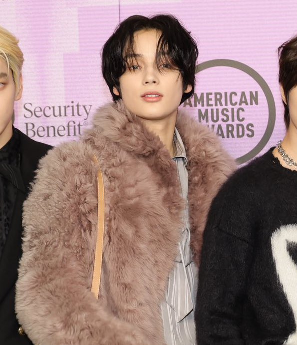 fur jacket guy at the amas