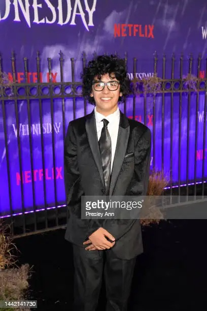 WarwickSchool's tweet photo. We are so excited to see Moosa in Year 10 starring in the new Netflix series ‘Wednesday’! Last week he was in Los Angeles for the premiere - the series airs this Wednesday and Moosa will be on screen next week! @wednesdayaddams #wednesdaynetflix https://t.co/Lt8ZIzUILU
