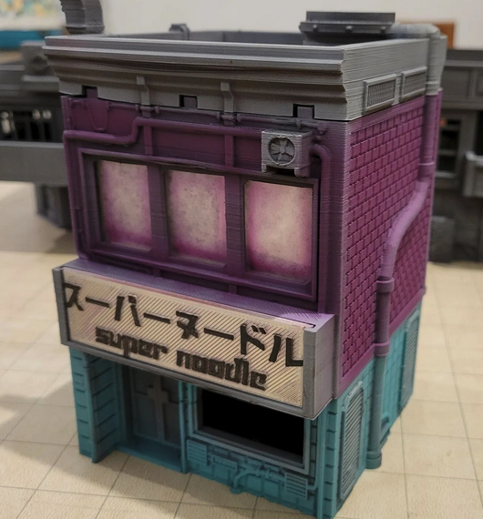 Corvusgamester1's tweet photo. Nice work by @blackvalenpaints on the #cyberpunk SuperNoodle building. https://t.co/Ln0BhHQumR #3Dprinting #wargaming #dredd #infinitythegame #realitysedge #bladerunner #Cyberpunk2077 #marvelcrisisprotocol #tabletopgaming #TTRPG #stargrave #5parsecsfromhome https://t.co/lPjEjWrZpK