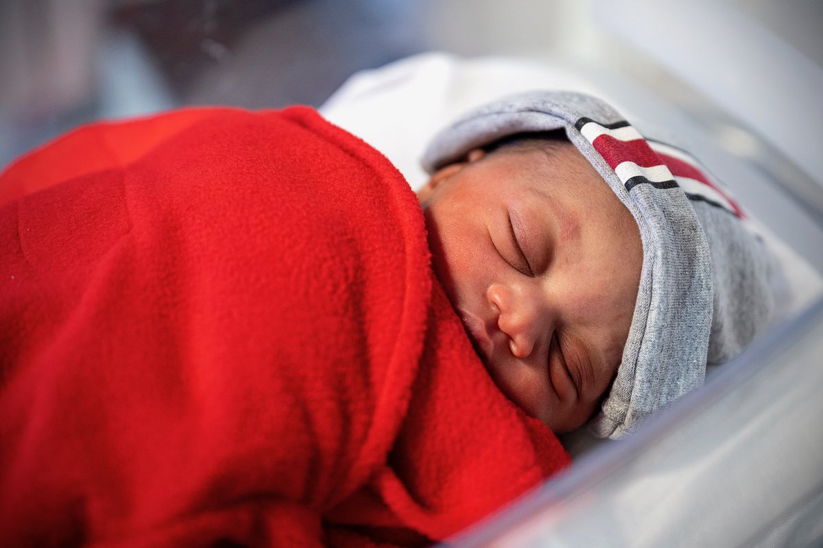 OSUWexMed's tweet photo. One of our favorite traditions here at #OSUWexMed, the Beat ❌ichigan swaddles for our newborns born this week. #BuckeyeBaby 😍 https://t.co/m4qV391q0f