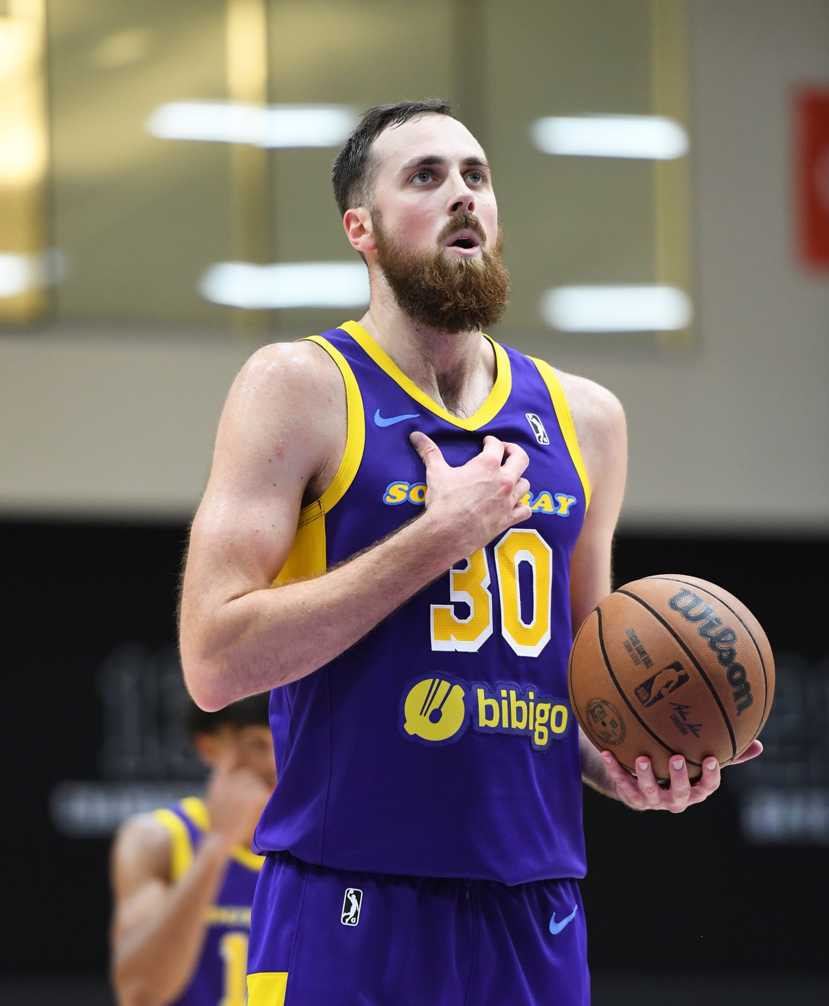 Jay Huff of the South Bay Lakers looks on from the bench before the News  Photo - Getty Images