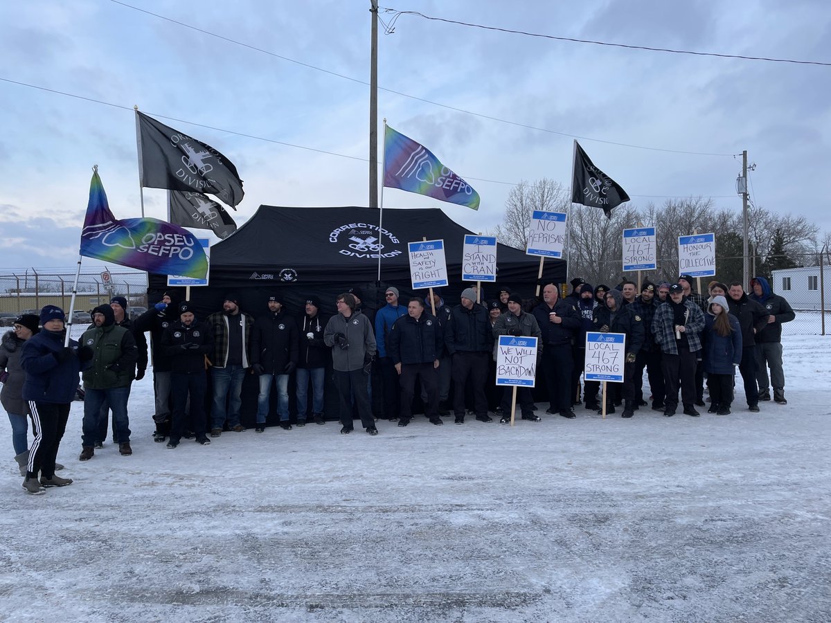 OPSEU's tweet photo. Members of OPSEU/SEFPO Local 467 standing strong together outside the Quinte Detention Centre this morning to send a message to bosses that union-busting and punishment for union activity must end! #Onlab #Solidarity #StandWithCran https://t.co/bmSHBDnLSp