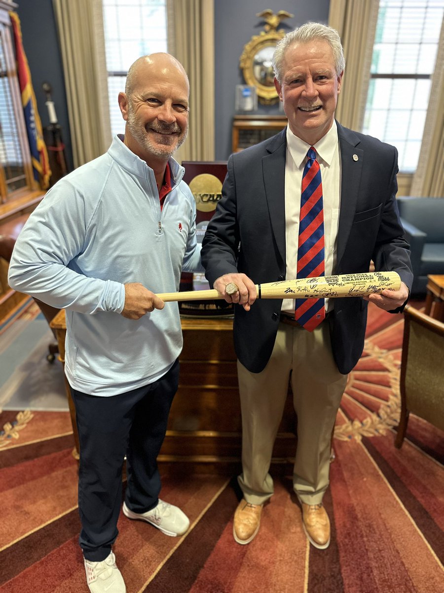 Ole Miss @CoachMikeBianco recently presented Chancellor Glenn Boyce with a National Championship ring and signed bat from the entire team! Keeping the momentum going at #TheFlagship 🔴🔵