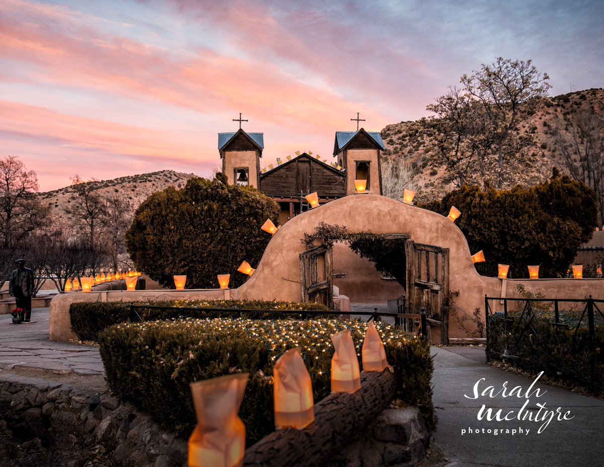 Perfect 🤌 sunset glow over the Santuario de Chimayo. Featured in my 2023 ”Holy Faith: Churches of New Mexico” calendar, available at: shop.sarahmpix.com/2023-calendars #chimayo #newmexico #newmexicotrue #landofenchantment #nmnomad #sunset #newmexicoart #2023calendar