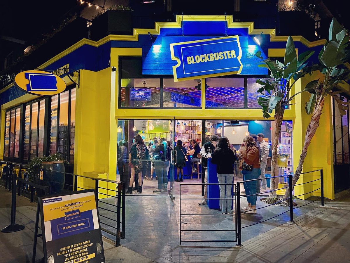 DevMichaelJones's tweet photo. We made it a Blockbuster night at the pop up bar in LA. The last picture is a pic of my real business card from 1989 when I was the youngest Blockbuster manager at 19 years old. #blockbuster #blockbustervideo #wowwhatadifference #makeitablockbusternight https://t.co/X1GxtWQA9t