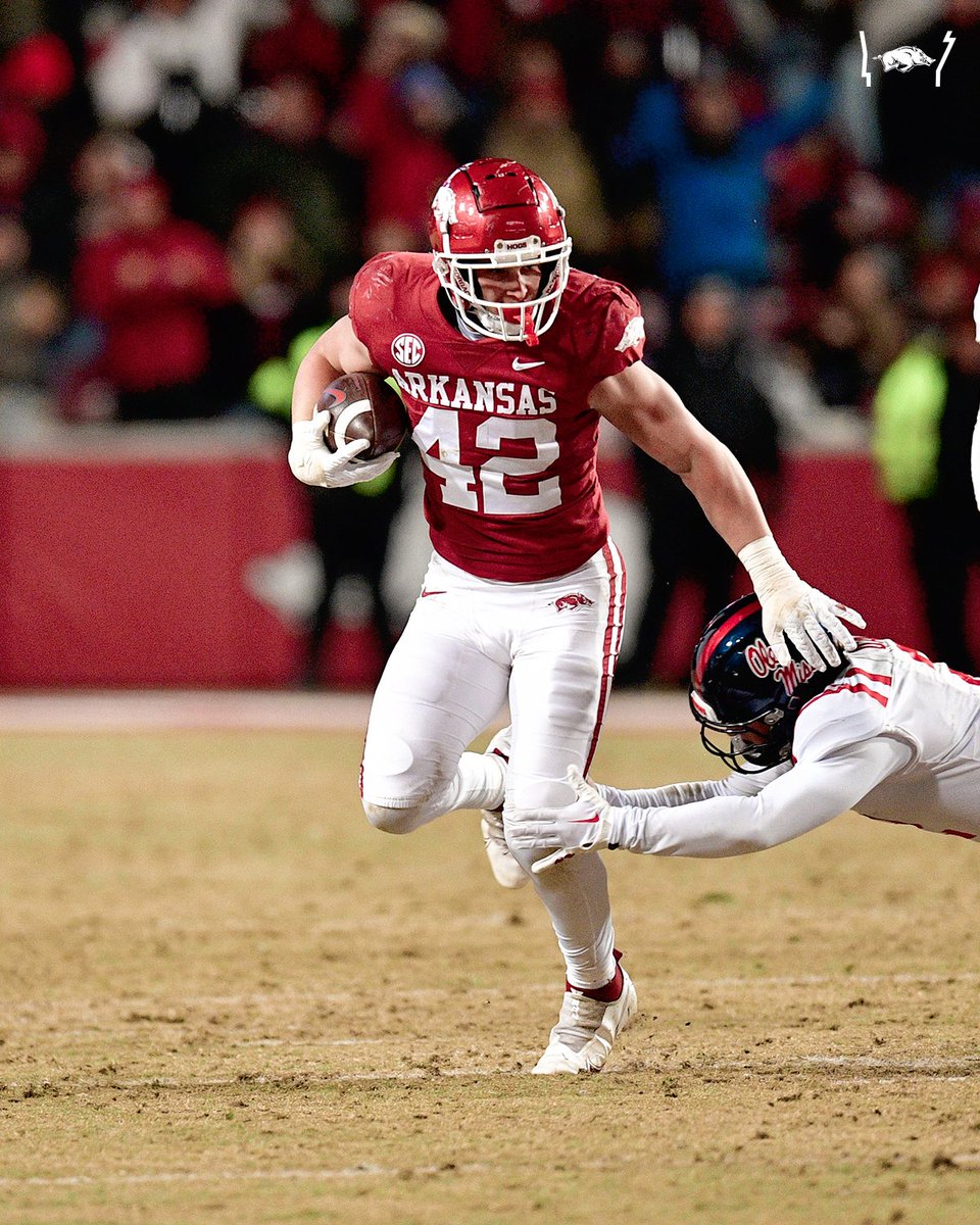 Since 2000, only two FBS players have totaled 95 or more tackles with at least 12 tackles for loss, eight sacks, three forced fumbles, a fumble recovery and an interception in a single season:

Buffalo LB Khalil Mack (2013)
Arkansas LB Drew Sanders (2022)