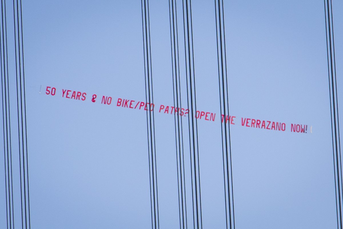 Staged by <a href="/RightOfWayNYC/">Right of Way</a> &amp; photographed by <a href="/rabonour/">Rabi Abonour</a> 8 yrs ago today (a day as blustery &amp; frigid as yesterday), the 50th anniv of the Verrazano Bridge's opening to cars &amp; trucks. It's now 58 years, and still no bike-ped access plan in sight. <a href="/bikenewyork/">Bike New York</a> <a href="/TransAlt/">Transportation Alternatives</a> <a href="/MTA/">MTA</a> <a href="/NYC_DOT/">NYC DOT</a>