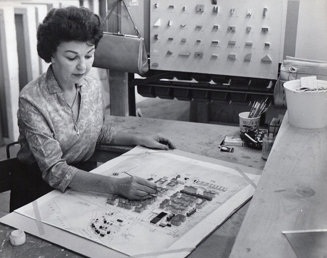 TheShedNY's tweet photo. For Straight Line Crazy’s poster, Ralph Fiennes stands at the center of a model of New York City, in costume as Robert Moses, surveying his public infrastructure projects. This model is “The Panorama of the City of New York,” housed at the Queens Museum in Flushing Meadows https://t.co/B5FHUEeSly