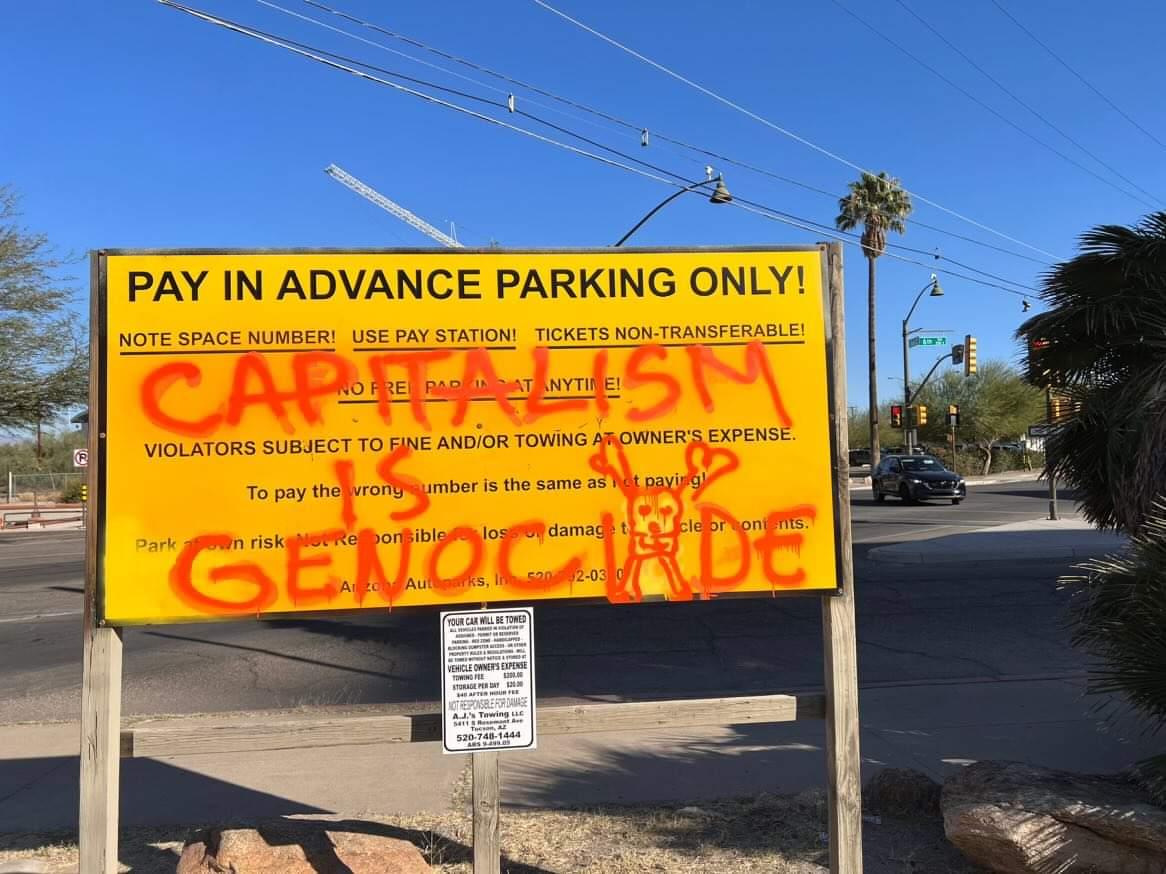 GraffitiRadical's tweet photo. "Capitalism is Genocide,"
Seen in Tucson, Arizona https://t.co/5B5fyDGVDV