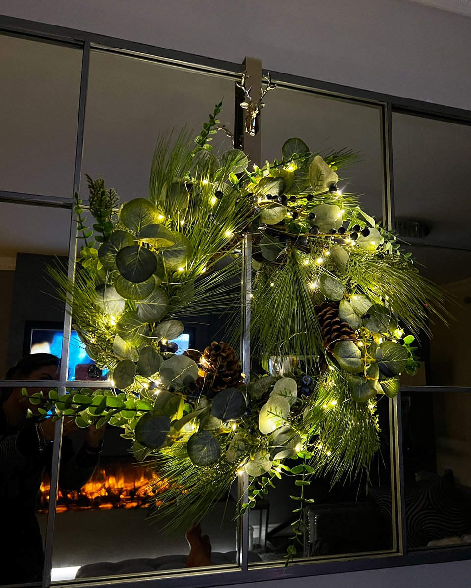 Love how this turned out. I added our berry wreath to the the mirror with wired battery lights on a reindeer wreath hanger. It looks beautiful 😍 contact us for details x