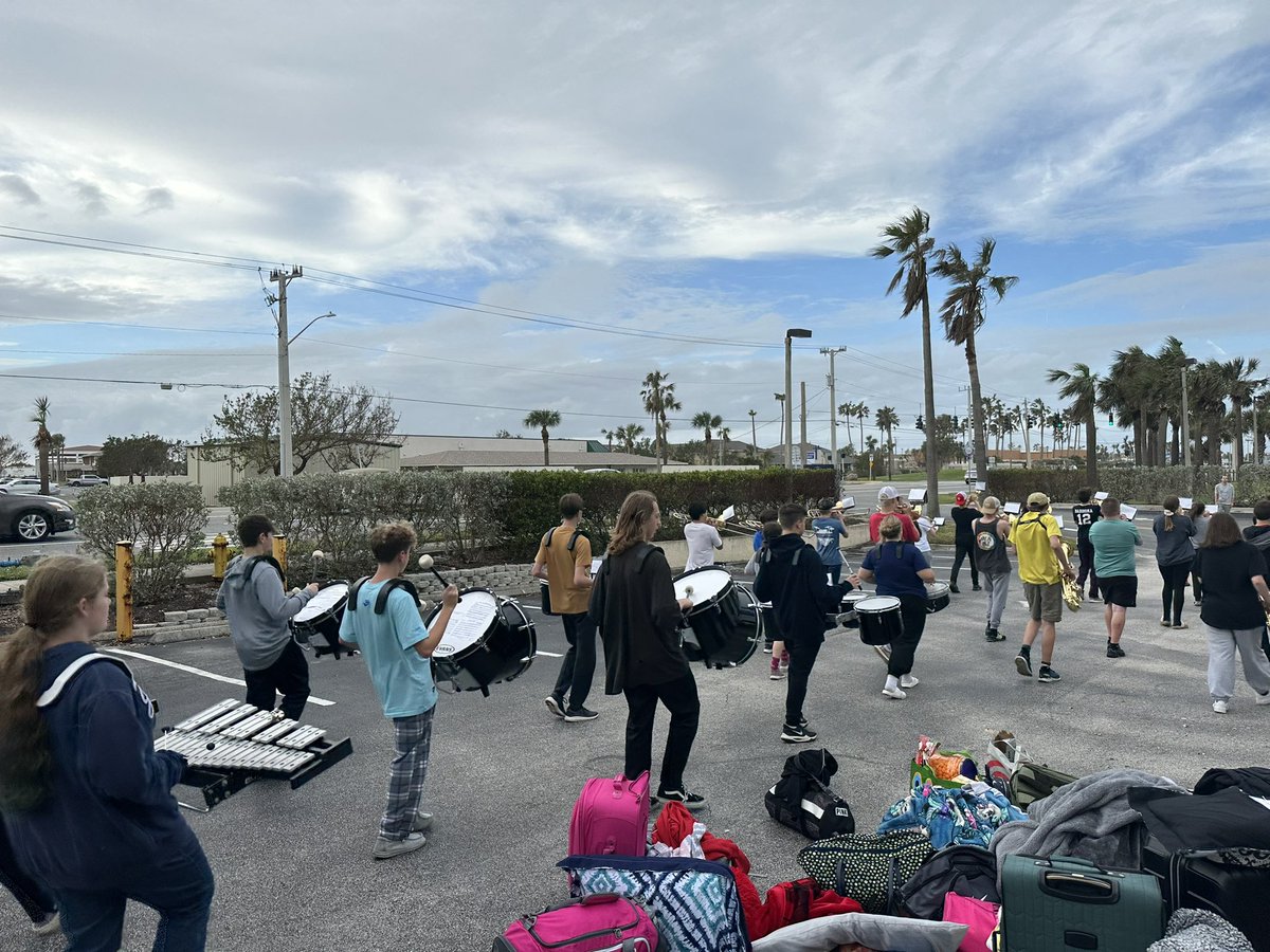 FeinestBand's tweet photo. Nothing like driving 1,200 miles and having marching band rehearsal 😛We’re a little tired, but happy and healthy. #wcsdletsgo https://t.co/P8DsWuMReg