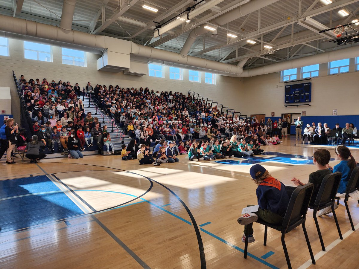 King Street School students and staff held their annual commemorative Veterans Day ceremony in the gymnasium on Nov. 10. As part of the longstanding tradition at Port Chester, students handed out a yellow rose to a family member – a veteran – who was invited to the ceremony.