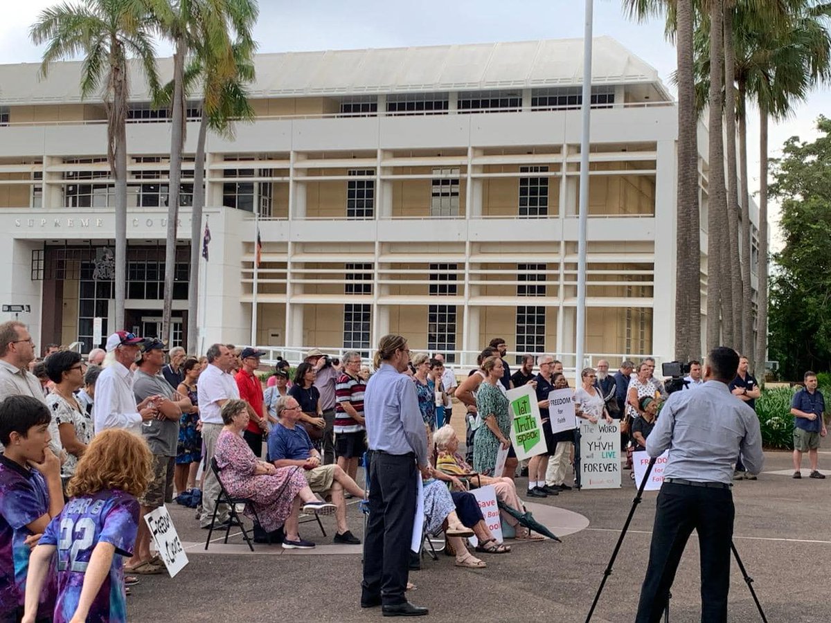 ACLobby's tweet photo. Last night, around 300 concerned citizens gathered for a Peaceful Prayer Rally at the NT Parliamentary Forecourt in Darwin to stand up against the Anti-Discrimination Amendment Act 2022 ahead of the discussion of this Bill in NT Parliament today. #nt https://t.co/PhhXweirGr https://t.co/wiRGW58MV5