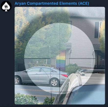 A picture posted by Ace showing them looking at a LGBT person's house through a scope