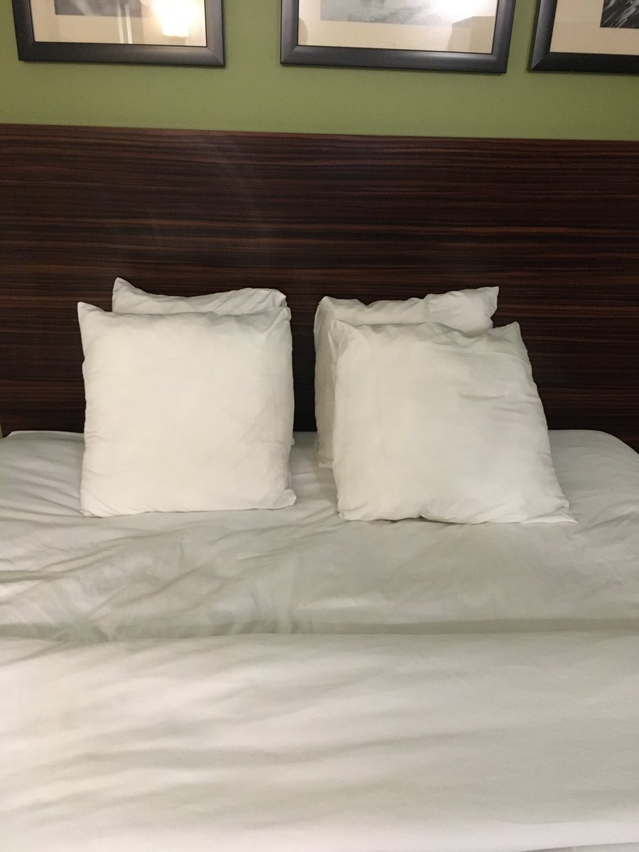 I don’t know if I like these little square pillows in this hotel room.