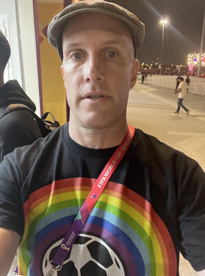 U.S. journalist @GrantWahl was detained for 25 minutes by Qatar World Cup security and then banned from the stadium after trying to enter the USA-Wales game wearing a LGBTQ T-shirt. It happened despite assurances from FIFA that LGBTQ flags and t-shirts would be allowed in Qatar.