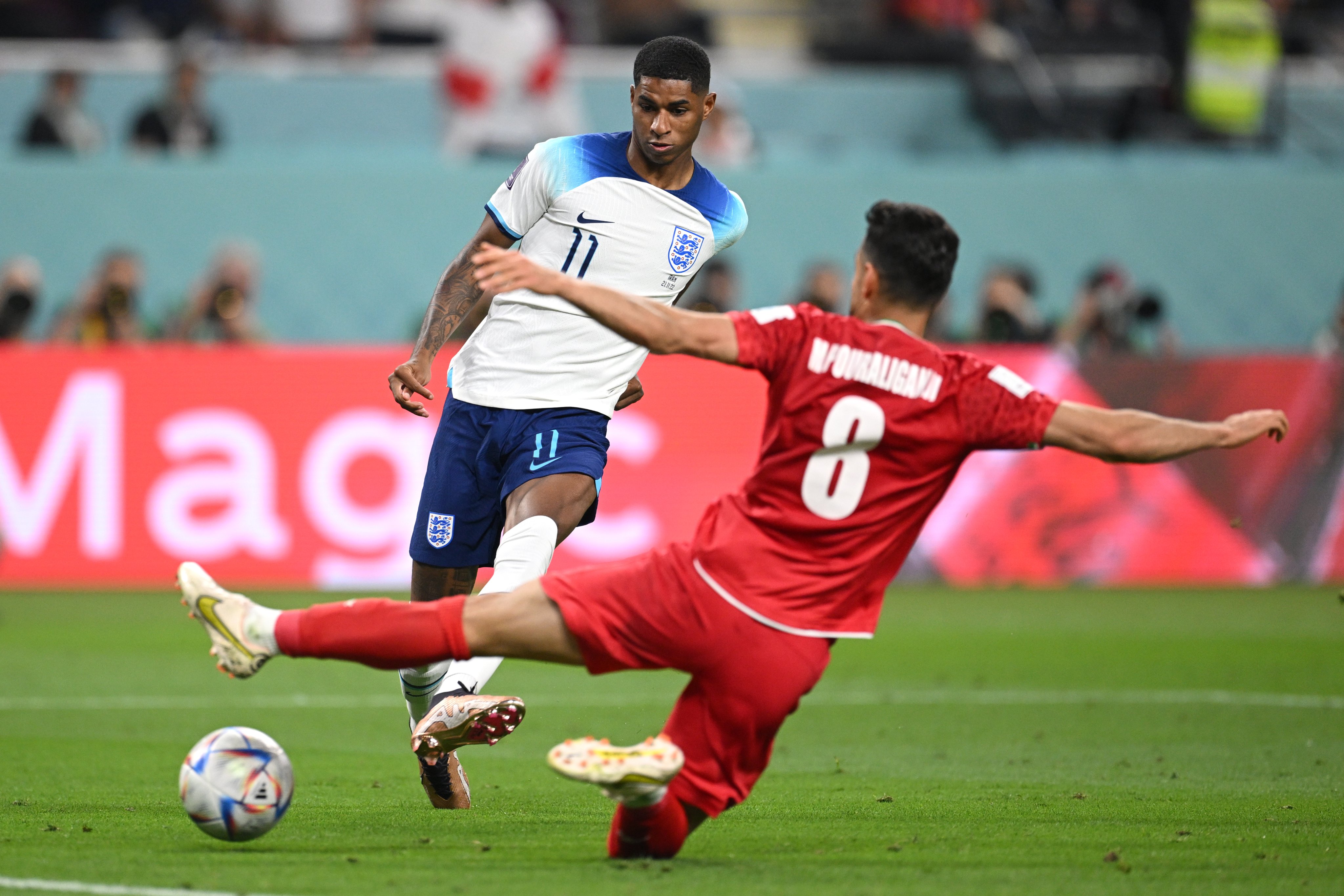 Marcus Rashford scores against Iran.