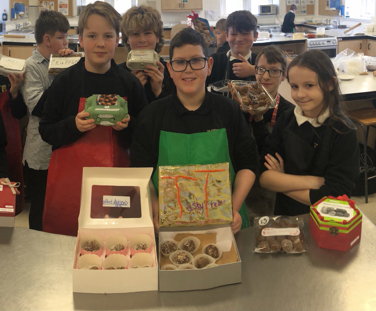 HomeHuntly's tweet photo. S1 pupils at The Gordon Schools proudly show off their Christmas Chocolate Truffles and packaging/ labelling! https://t.co/rsBH1PZcF0