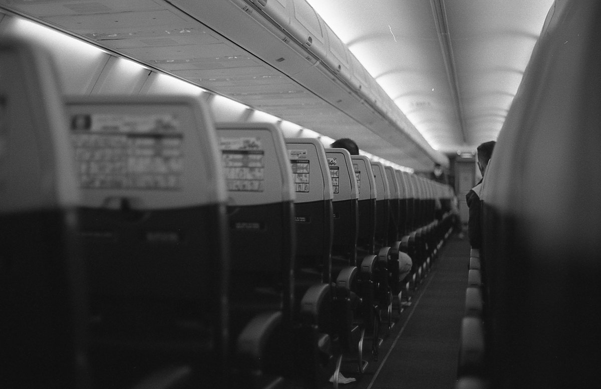 'No destination'. Part of my 'STORIES FROM AROUND' collection.
This was taken somewhere above the Atlantic Ocean after a frustrated landing on a plane to the Canary Islands. The three people on the picture and myself were the only ones in the plane.
#photo #NFT #blackandwhite