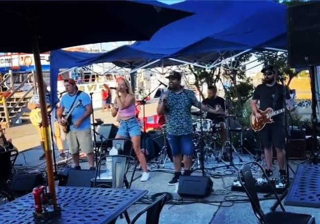With the weather turning cold, here’s a shot of Where Stars Collide playing in warmer temperatures at Tiki Joe’s Captree Boat Basin.