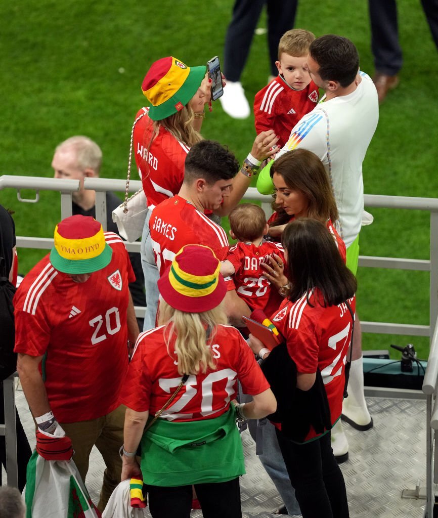 ItsAWagWagWorld's tweet photo. #RebeccaNaylor #DannyWard & son Albie, #RiaHughes #DanielJames & son Layke were pictured after Wales draw against US. #USAvWAL #WorldCup #Leicester #FulhamFC https://t.co/6NfrJm9V1P