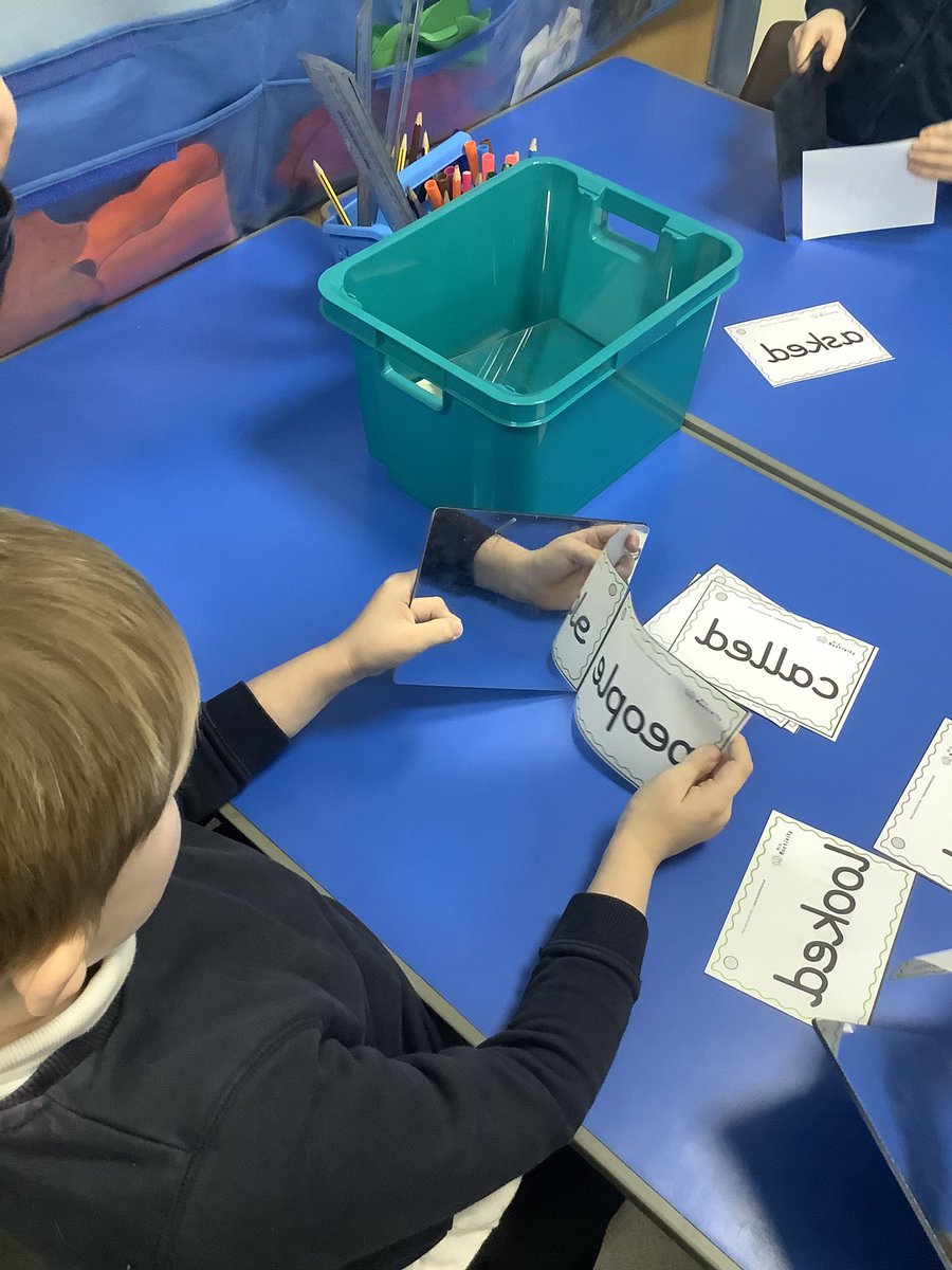 BandBschool's tweet photo. Oops! Miss Catterall printed our tricky words backwards! 🤦‍♀️ Team Aire are using mirrors to reflect the words and read them correctly. #BandBEarlyReading #BandBSTEM #BandBAire @MrsMactivity @eboractrust https://t.co/lQ825D5fKO