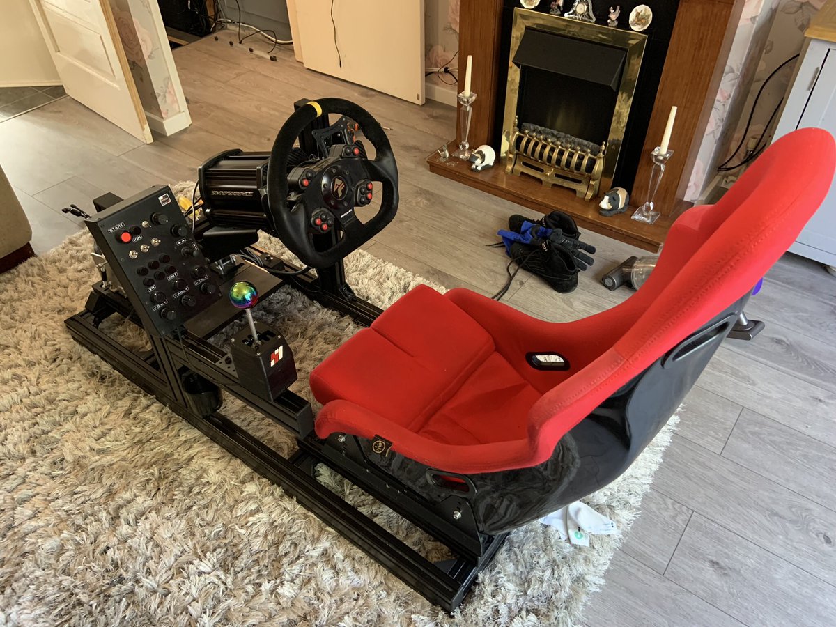 Rig_Racer's tweet photo. We are now reaching the final stage in my #simrig setup and it’s what I now use for my #Simracing I swapped out my DIY wooden rig for a #simlabs GT1 EVO and a rather bright bucket seat ! With the sim cupboard now painted I think it’s time to stop tweaking, maybe 🤔 https://t.co/SylYIppyW4