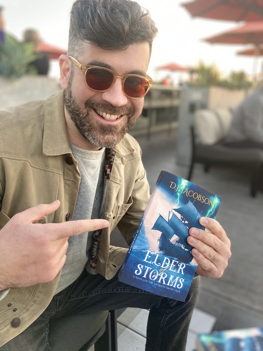 AngelaParkerFIT's tweet photo. My client @djjauthor wrote a novel!! It was an honor meeting IRL (1st time) in L.A. for his Elder of Storms book party. 

❤️I'm a proud coach of this tech entrepreneur and honored to be the first person he signed a copy of his book for. https://t.co/UAn5aDENQR