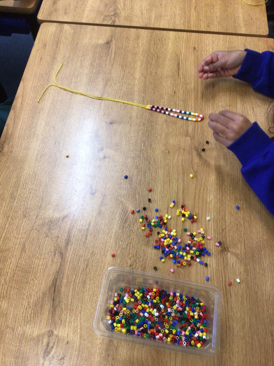 Mrs_Fairhurst's tweet photo. After a break for lunch, we are making some jewellery using beads. This is similar to some of the jewellery from the rainforest, as they use small seeds to create beautiful patterns. We are busy getting creative! https://t.co/QGCHbACtXe