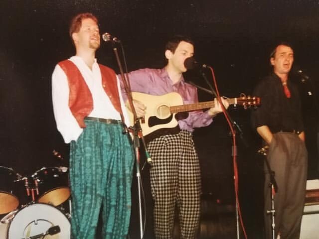 AdrianFreedman2's tweet photo. A true blast from the past, on stage in Warszawa in 1992, with Hugh Nankivell and Marek Siurawski. Special point of interest - the trousers! https://t.co/x97OeGX856 https://t.co/taOHeoyFML