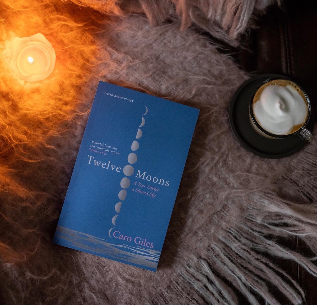 Love these lush images of Twelve Moons looking cosy. An ideal companion to candles and coffee. Thanks <a href="/georgieglass_/">Georgie Glass</a>. Much of it was written by candlelight so this seems a natural home 🌙