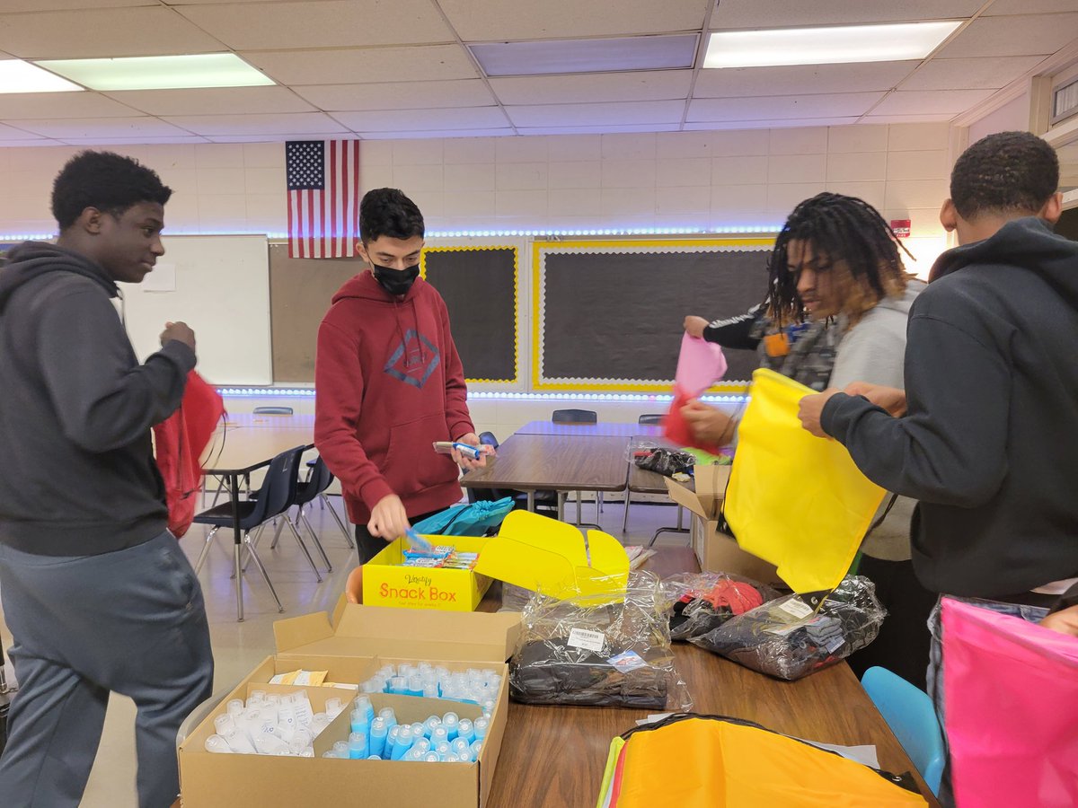 WGHS learning hub males working together to create kits for the homeless. #gohornets