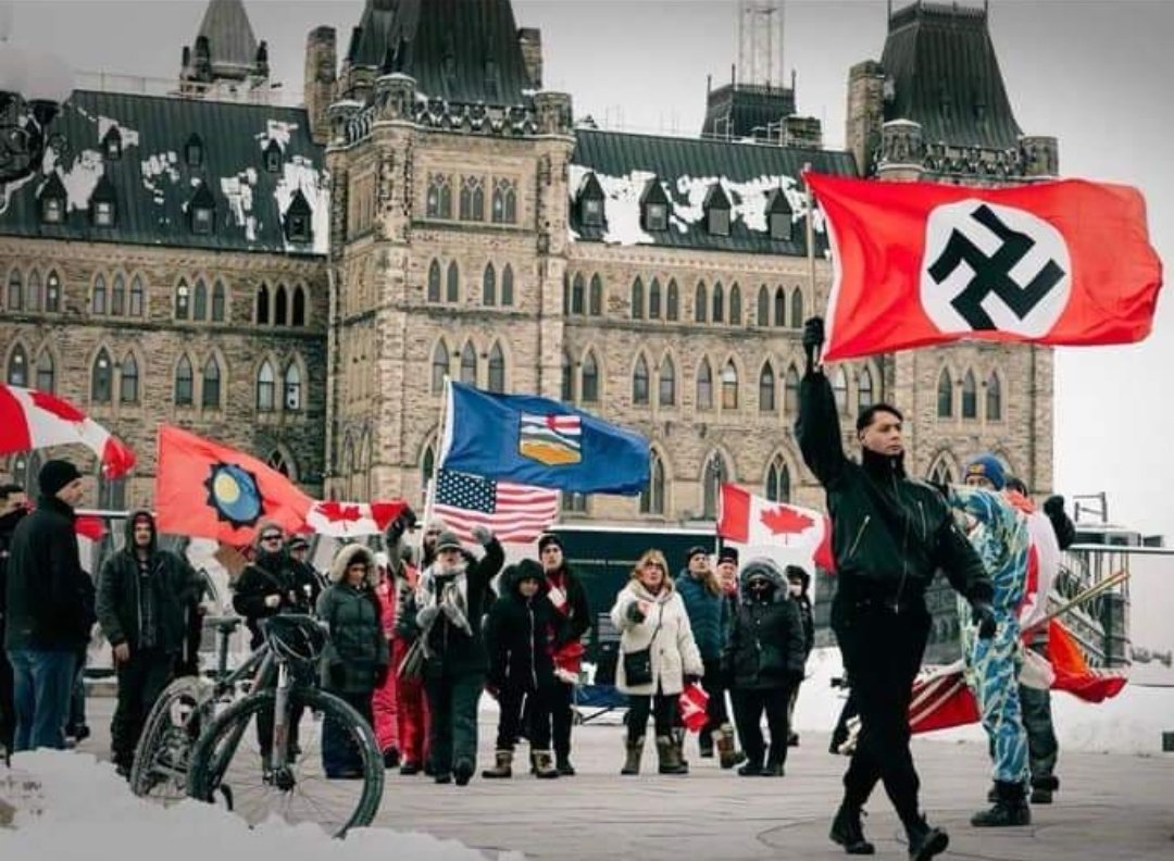 KrisSimone5's tweet photo. @bk_belton Cons will climb into bed with anyone if it serves their purpose. Have we ever seen Nazi flags in our capital or waved over our veterans War Memorials? For people with absolutely no rights, they sure manage to get around.
#AnyoneButCons https://t.co/LGruThIzOc