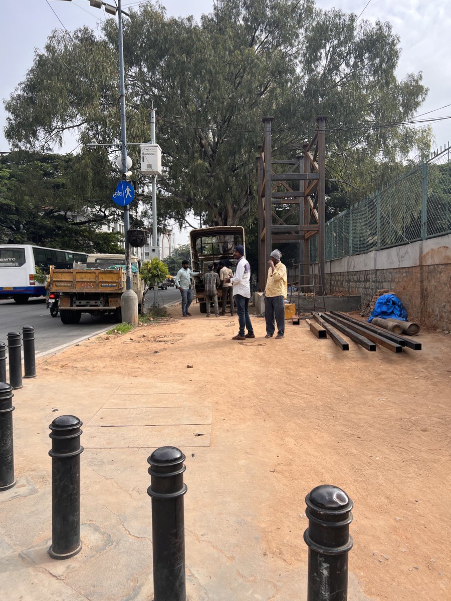 tarauk's tweet photo. The mutilation of Residency Road pavement with a skywalk instead of a signalled grade-level pedestrian crossing useable to all. Cometh the election, cometh the concrete. https://t.co/TJQLilTgsb