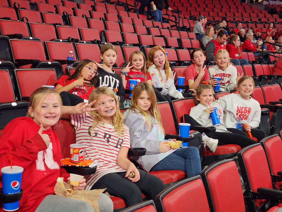 CaseyPflanz's tweet photo. 4th grade Wahoops team cheering on the Husker women's hoopers. #Husker @HuskerHoops @Huskers https://t.co/uiDphFCYch