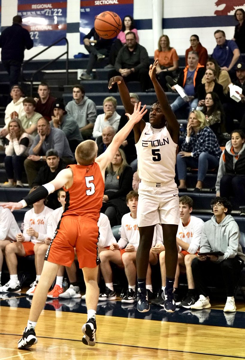Evanston’s Ephraim Chase #5 shoots a three pointer at the end of the second period, seconds before the clock runs out as Evanston trails Libertyville, 29 to 31 at the half. <a href="/ETHSports/">Evanston Athletics</a>  <a href="/ViatorClassic/">Saint Viator Thanksgiving Classic</a>