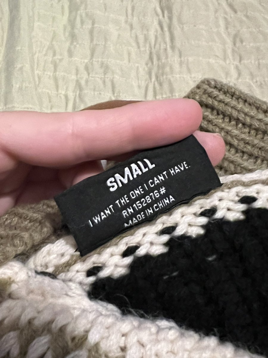 nicoarletta's tweet photo. okay so i bought the cardigan louis was wearing on release day bc it’s actually something that fits well into my wardrobe AND CAN WE JUST TAKE A PAUSE TO READ THE TAGS ON IT 😵‍💫 I’M NOT OKAY https://t.co/APt0nbsNXl