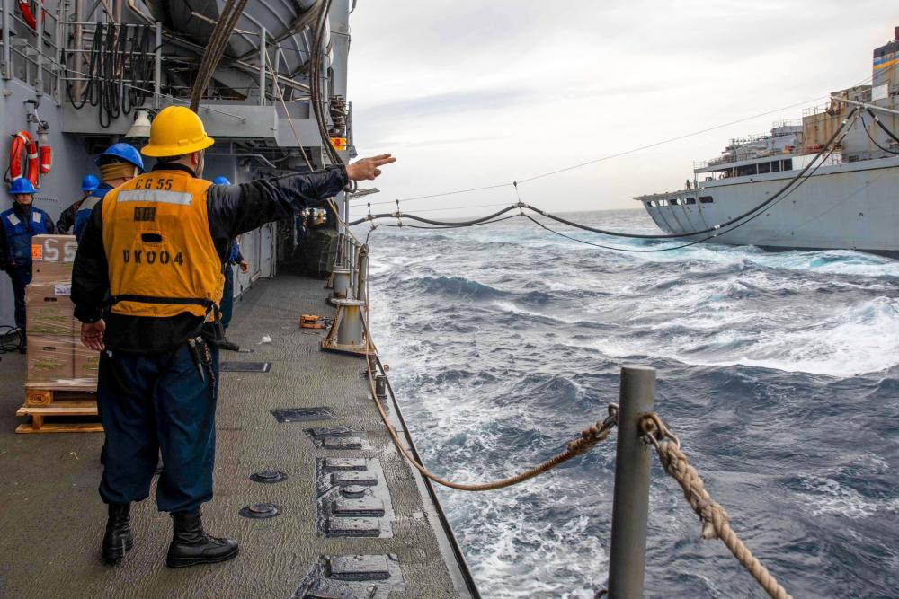 USS Leyte Gulf #CG55 Sailors heave a line from USNS Arctic #TAOE8 during a replenishment-at-sea. The ship is on deployment in the U.S. Naval Forces Europe area of operations, employed by U.S. 6th Fleet to defend U.S., allied, and partner interests.