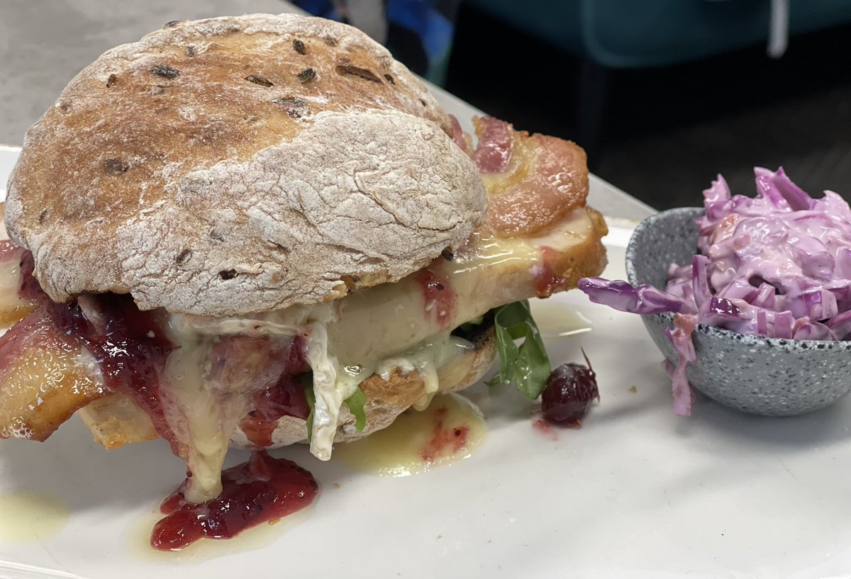 The Christmas Sandwich!  Turkey breast, streaky bacon and brie served with cranberry sauce and rocket in a sourdough and onion roll!  Delicious!  Just one of our tasty seasonal dishes available now! #christmas2022 #Foodie #harrogate