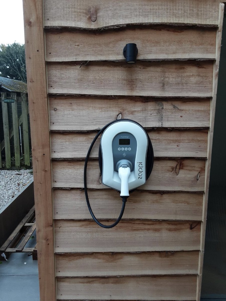 A Beautifully installed Zappi Charger in white, request a quote here crystalevcharging.co.uk #evchargerinstall #carchargers #workplacecharging #evchargingstation #evchargingstations #electricvehichlechargingstations #chargingstation #evchargerinstallation #charger