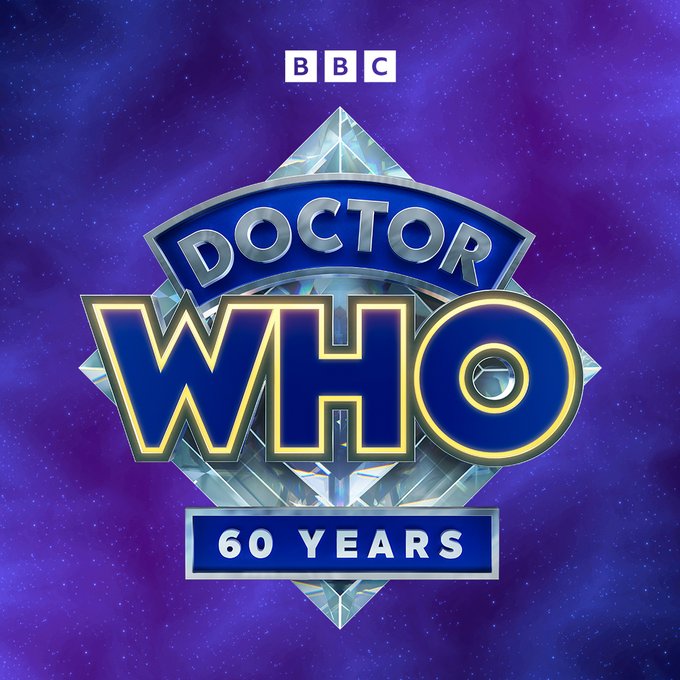 Graphic depicting a new variant of the diamond-shaped Doctor Who logo. The diamond shape is styled to look like actual diamond, and the strapline "60 YEARS" has been added to the bottom.